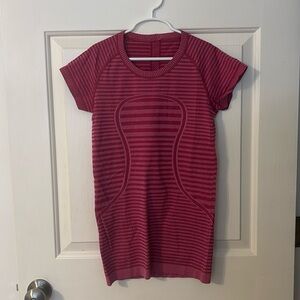 This is a maroon swiftly tee from lululemon